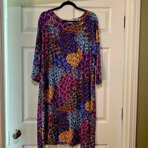 Bright colored 3/4 length sleeve dress. Never worn!